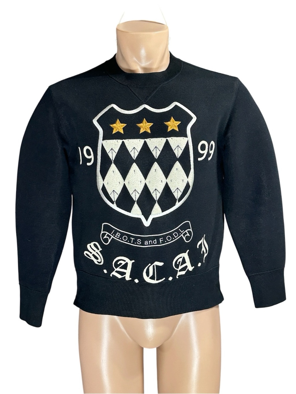 Sacai Black Crewneck Sweatshirt with Cream Shield and Gold Stars